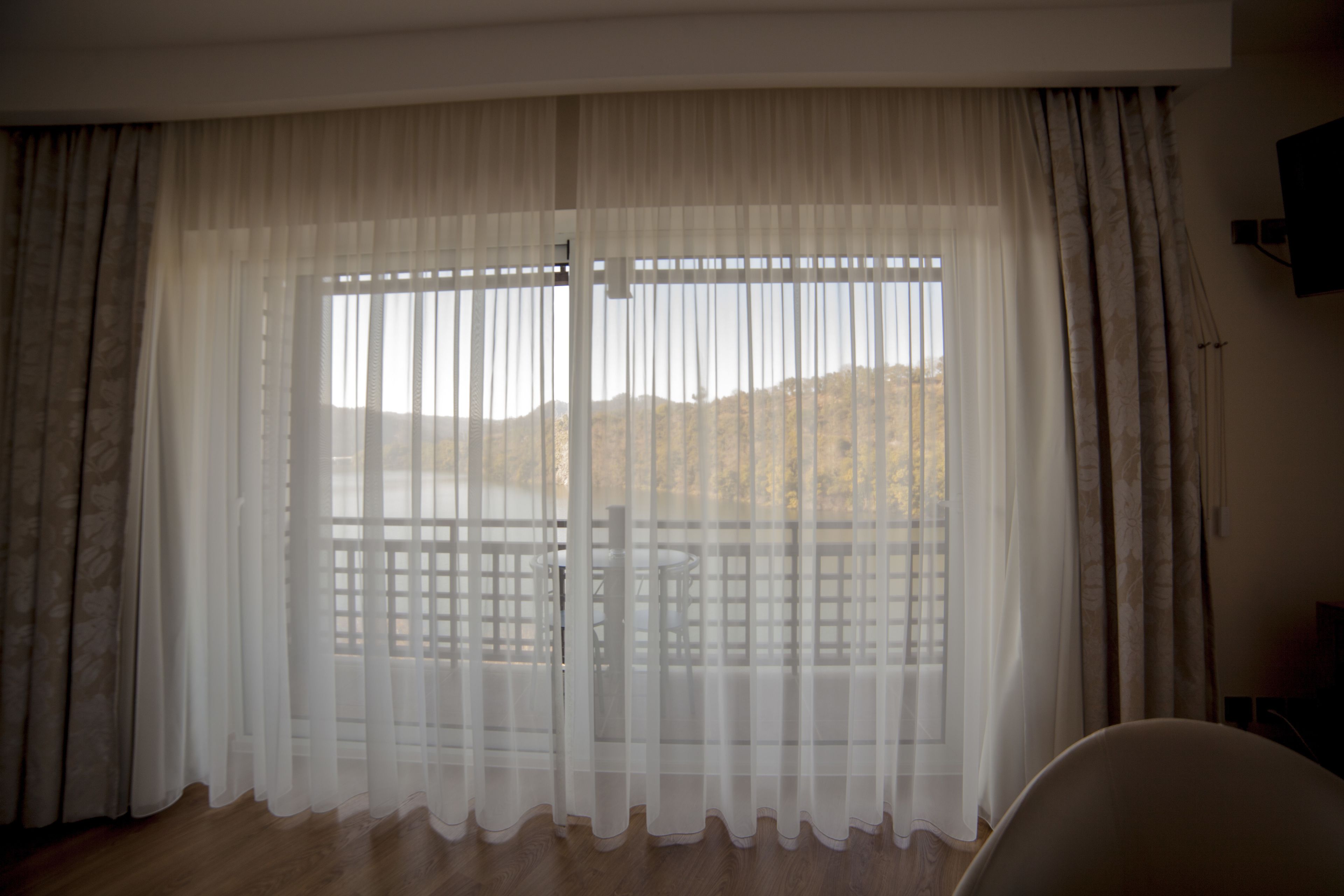 panoramic suite, river view | room amenity