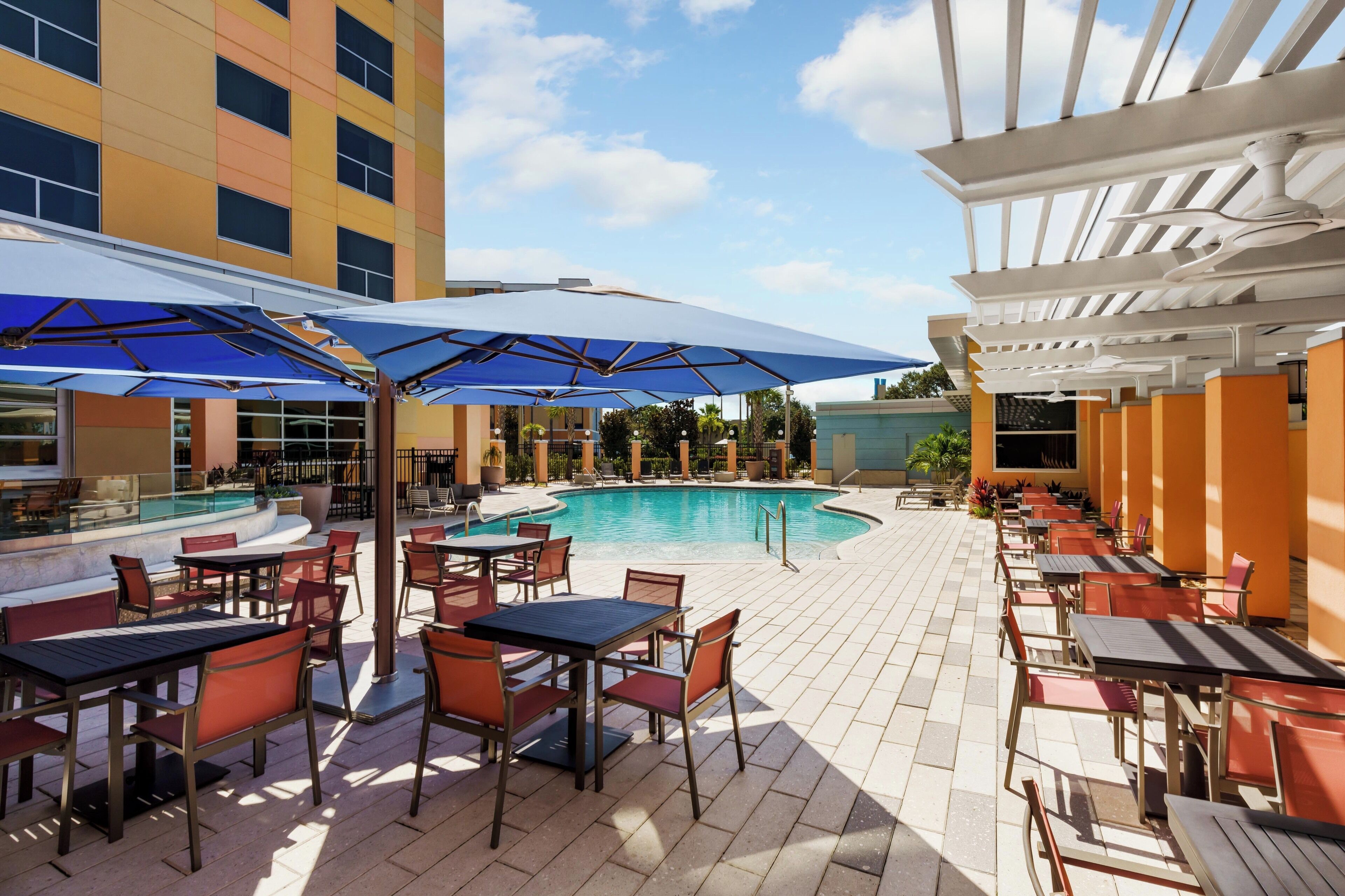 outdoor pool, open 10 am to 10 pm, pool loungers