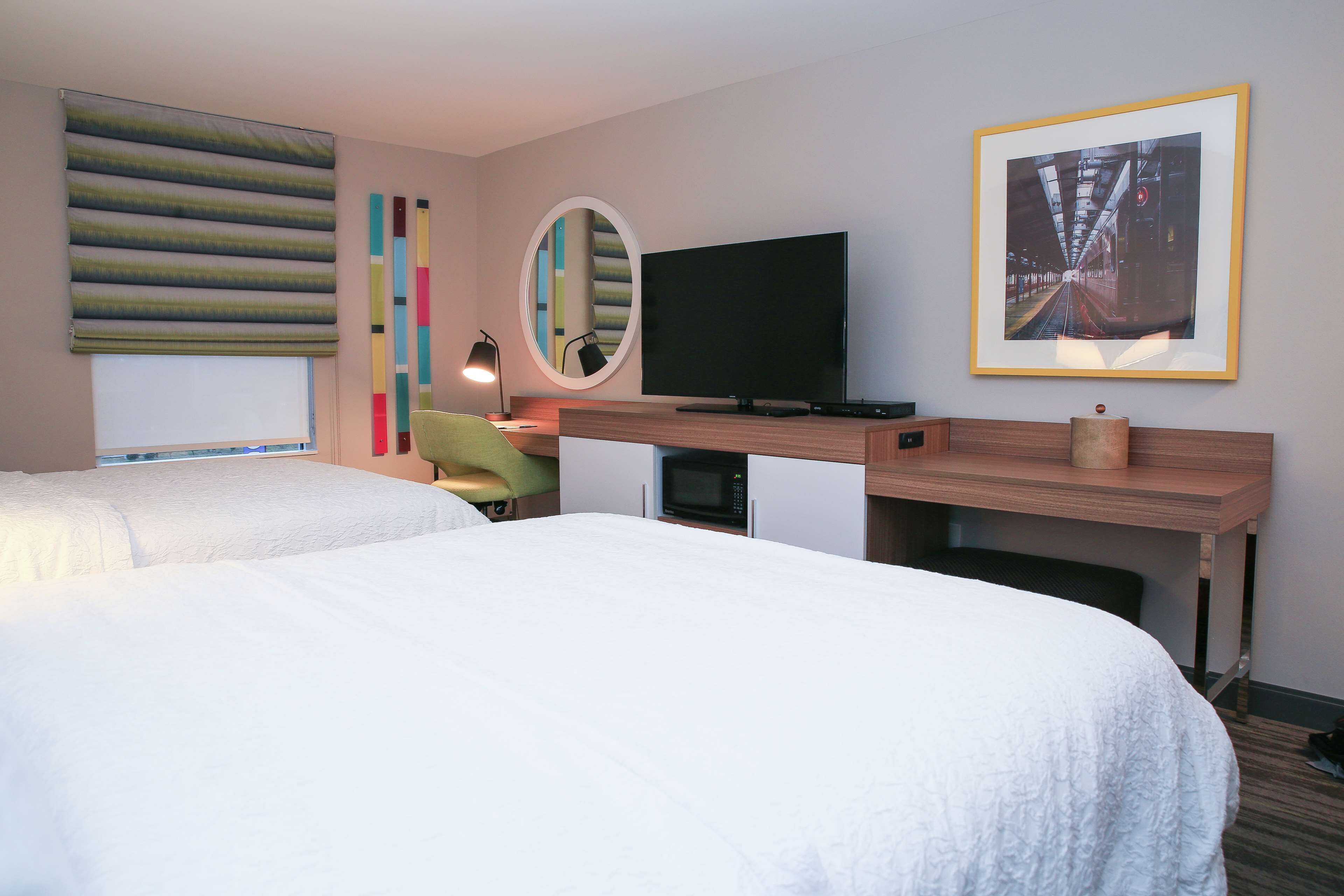 room, 2 queen beds, refrigerator & microwave | free cots/infant beds, free wifi, bed sheets