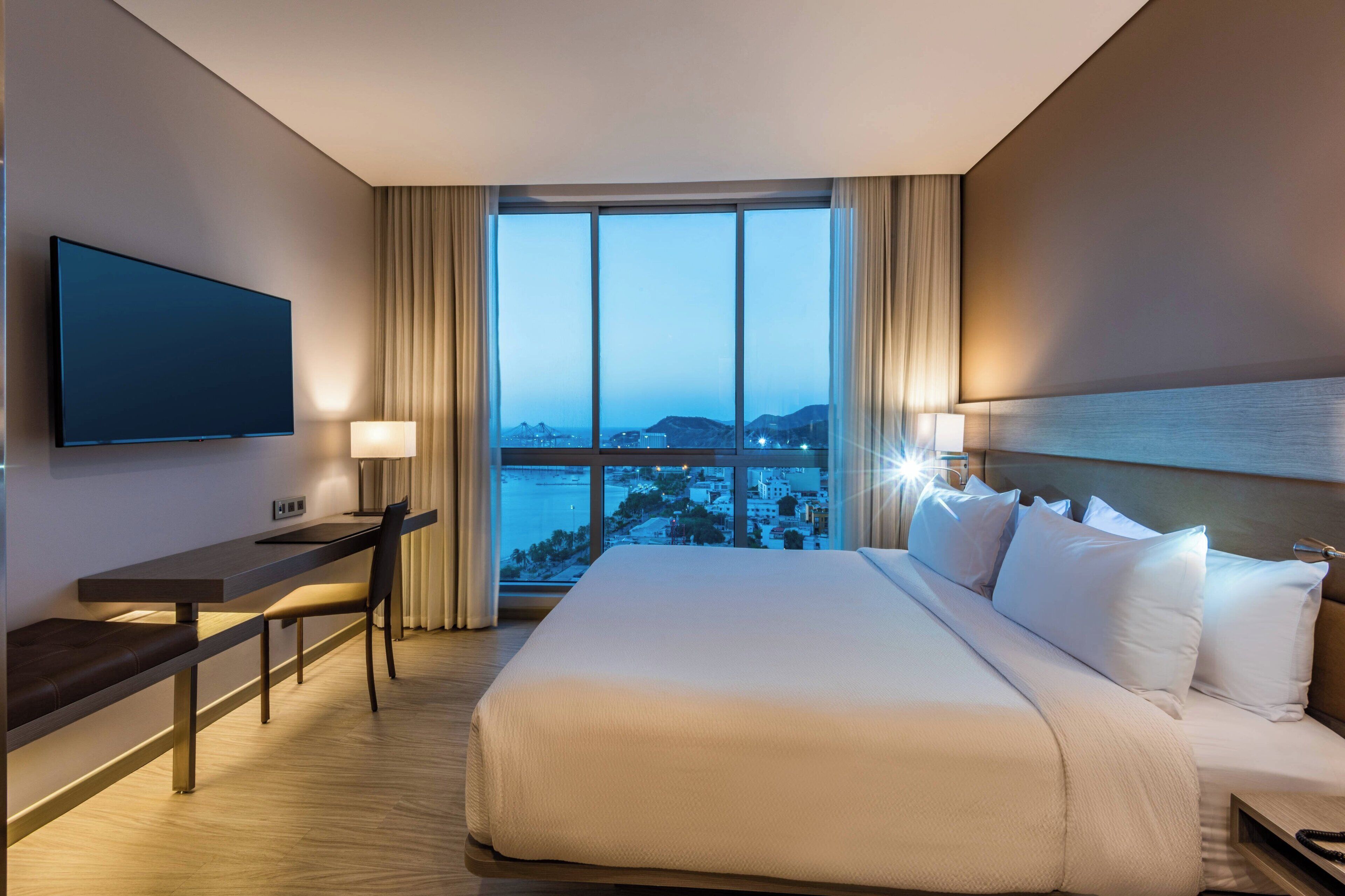 room, 1 king bed, non smoking, city view | in-room safe, desk, soundproofing, iron/ironing board