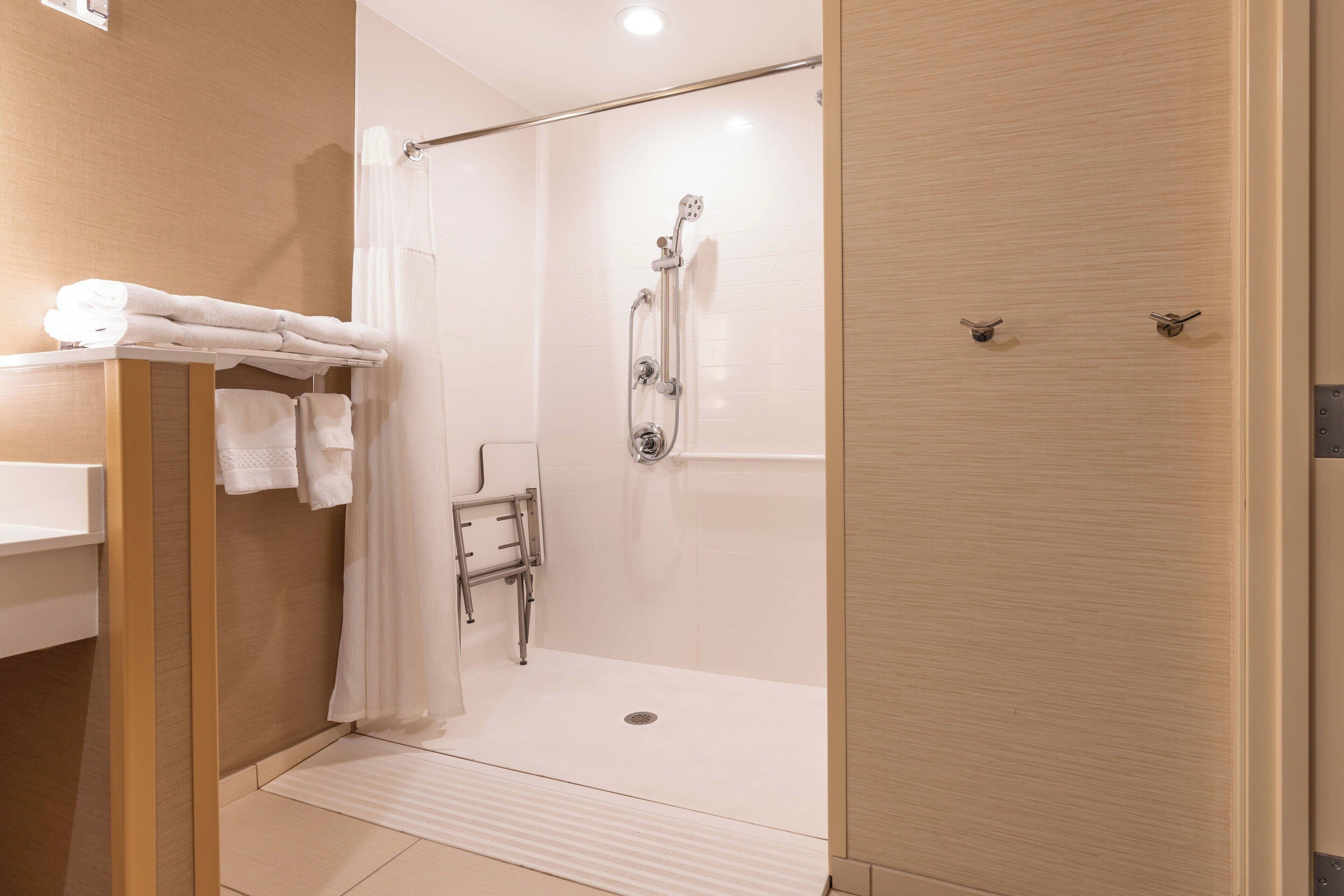 separate bathtub and shower, free toiletries, hair dryer, towels