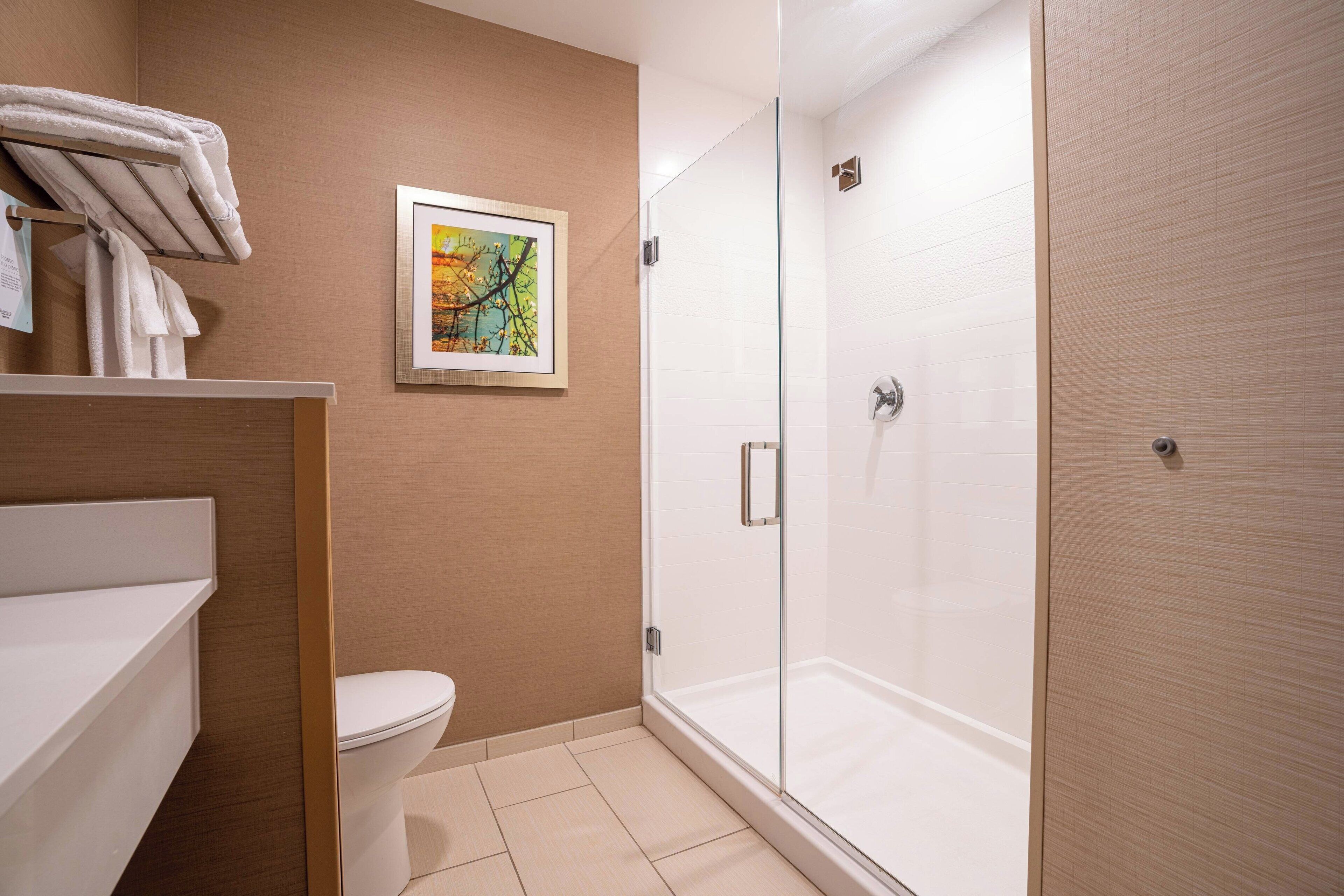 separate bathtub and shower, free toiletries, hair dryer, towels