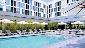 Outdoor pool, open 6 AM to 10 PM, pool umbrellas, sun loungers