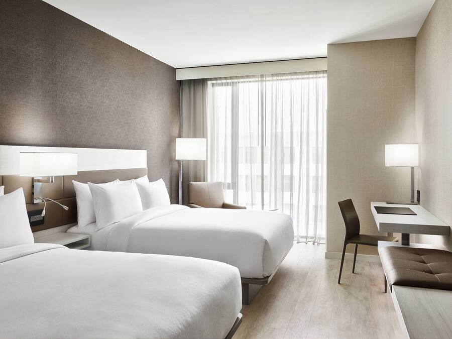 Room, 2 Queen Beds | 1 bedroom, premium bedding, in-room safe, desk