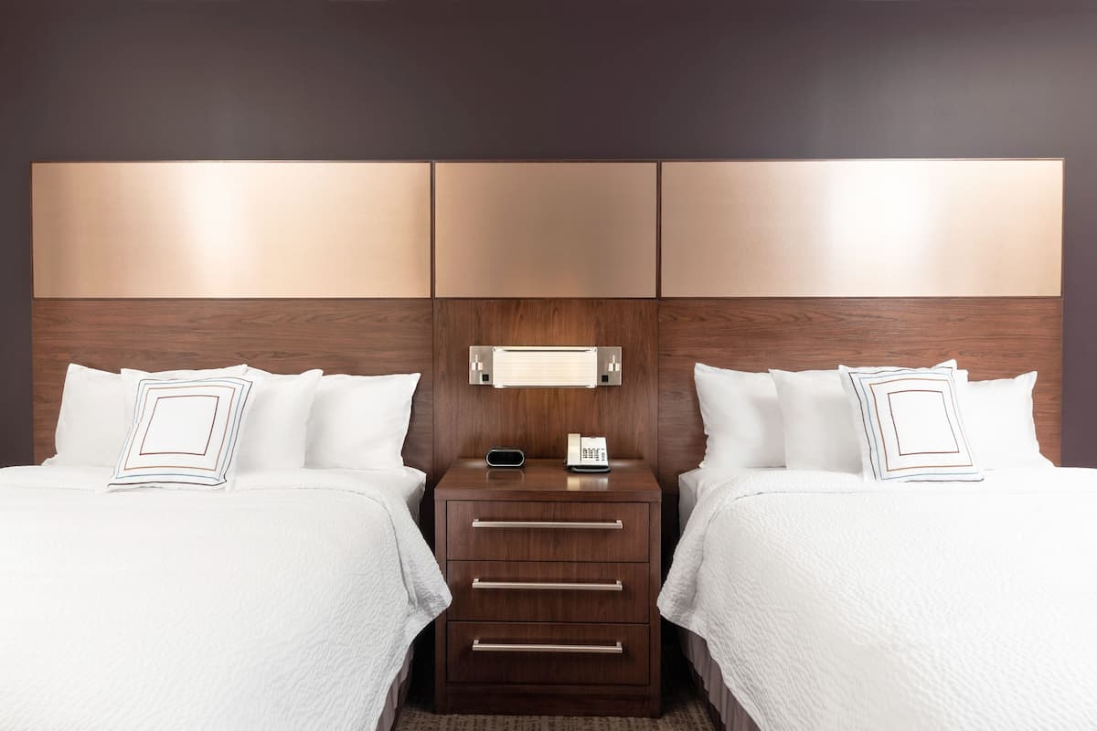 studio, multiple beds | in-room safe, desk, blackout curtains, iron/ironing board