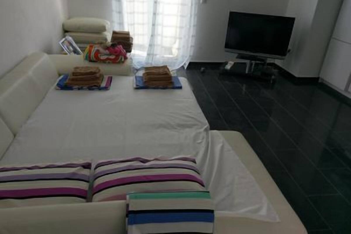 Deluxe-Apartment, 1 Schlafzimmer, Meerseite | 1 Schlafzimmer, Schreibtisch, schallisolierte Zimmer