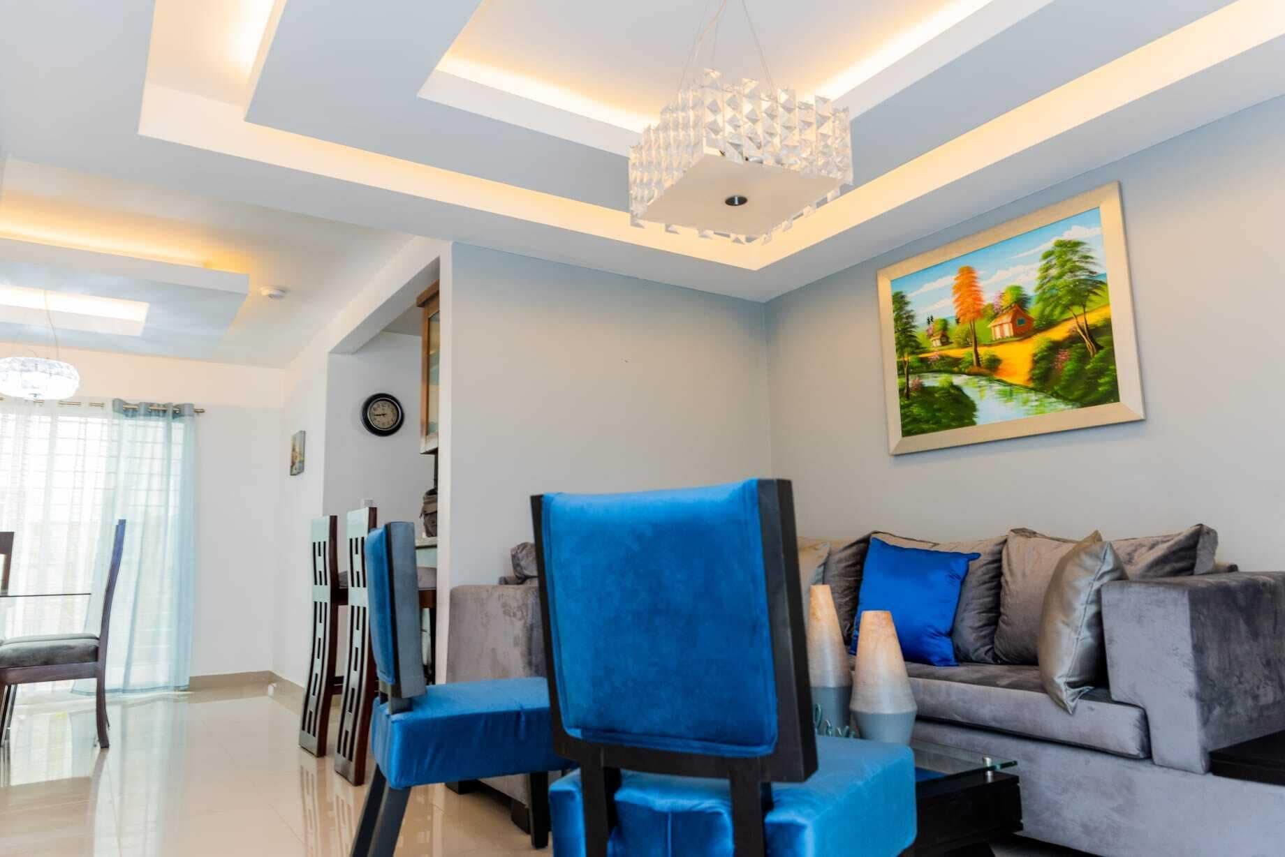 Apartment, 3 Bedrooms | Living area | Flat-screen TV, fireplace