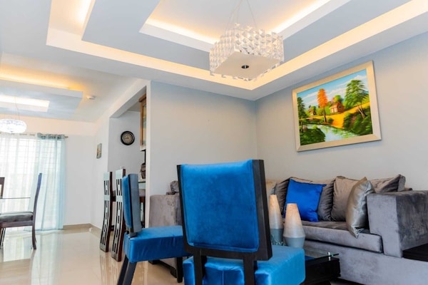 Apartment, 3 Bedrooms | Living area | Flat-screen TV, fireplace