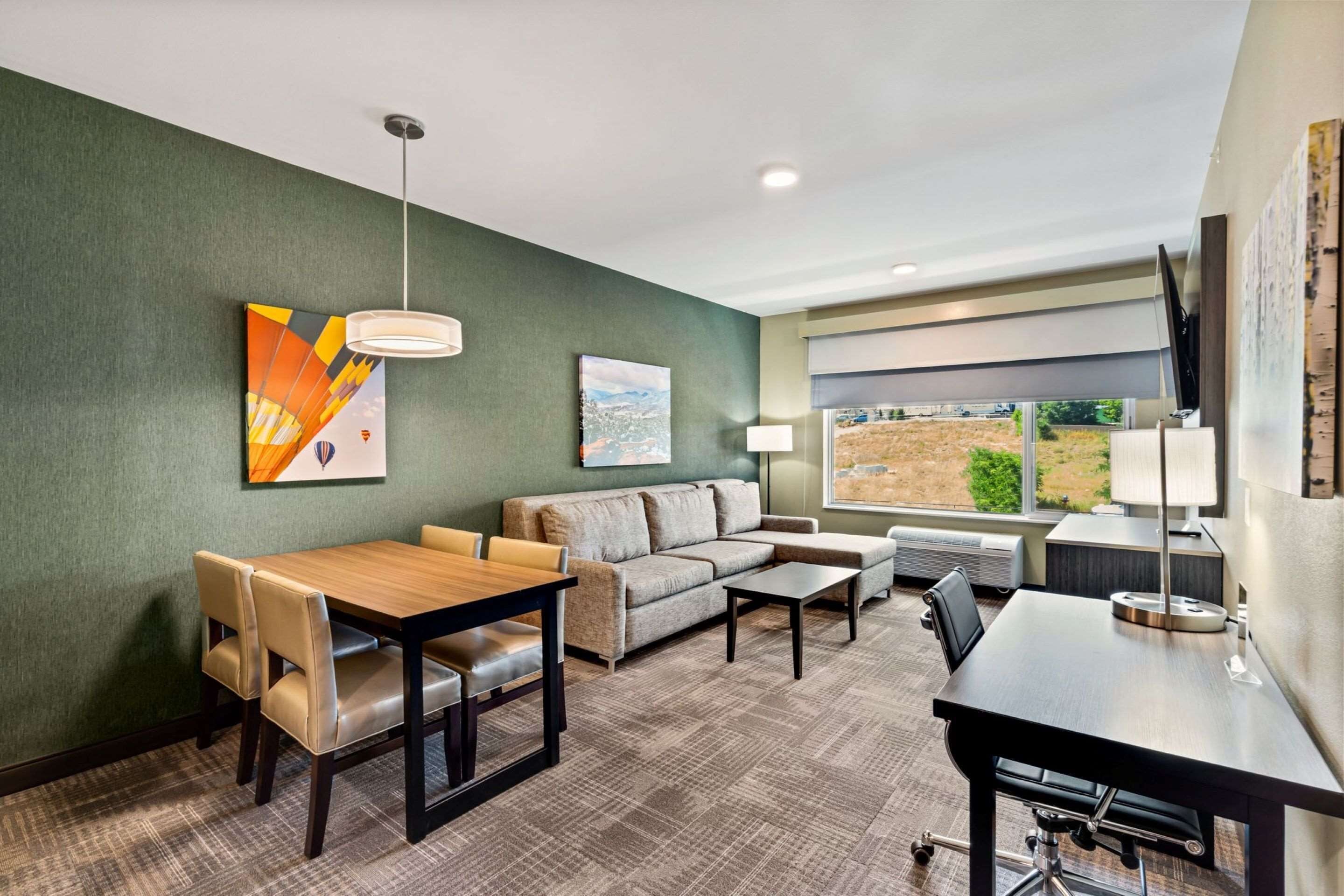 Suite, 1 King Bed, Non Smoking, Kitchen (Living Room, Full Kitchen) | In-room safe, desk, laptop workspace, iron/ironing board