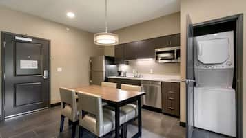 Fridge, microwave, coffee/tea maker, cookware/dishes/utensils