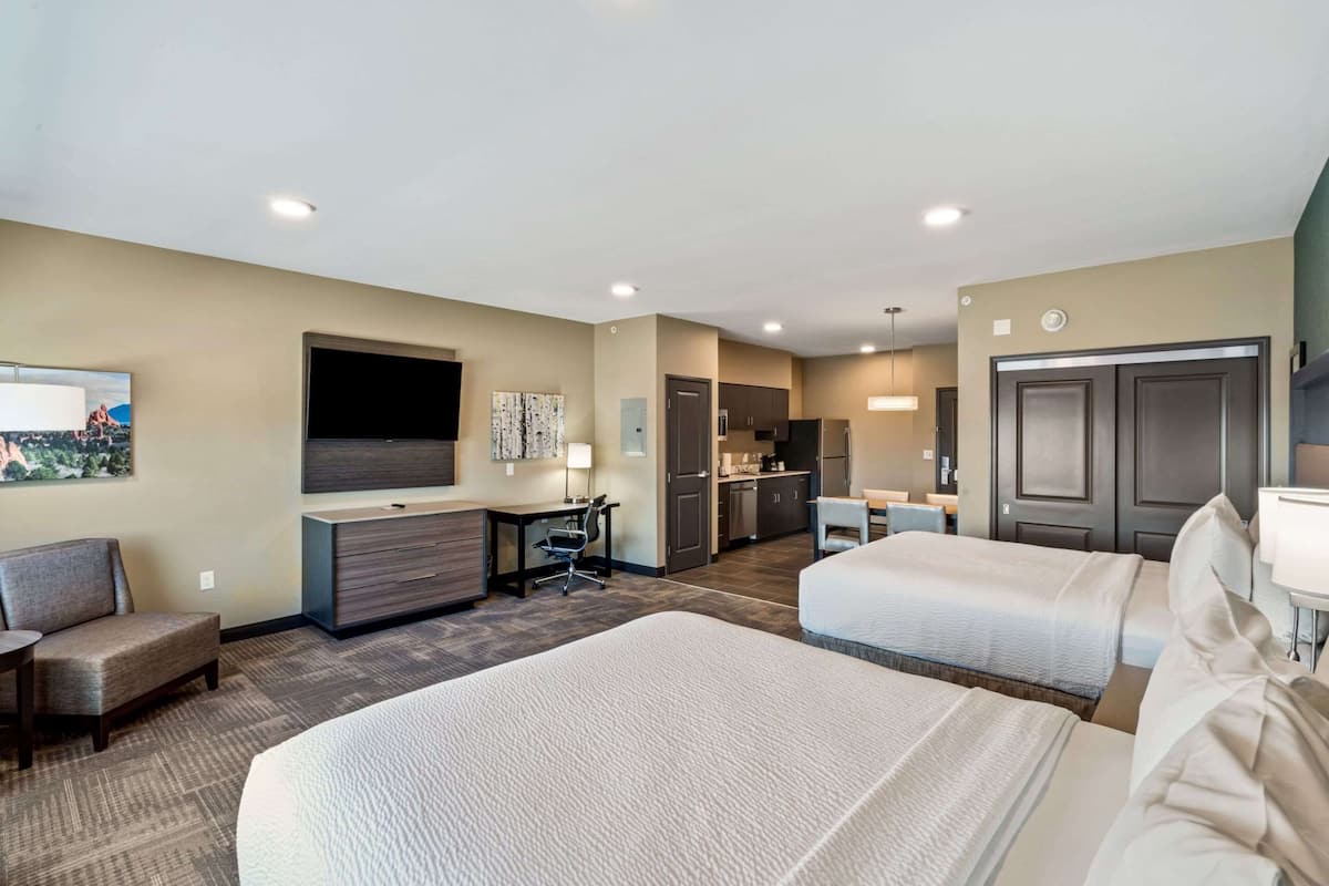 suite, 2 queen beds, non smoking, kitchen | in-room safe, desk, iron/ironing board, free wifi