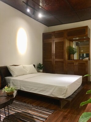 Signature Studio, 1 Bedroom, Smoking, Garden View | 1 bedroom, desk, iron/ironing board - A Green Home (Hanoi)