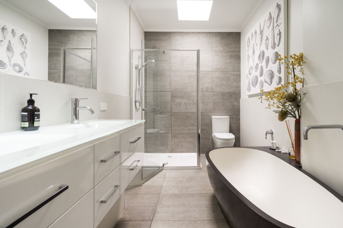 Bathtub, hair dryer, towels, soap