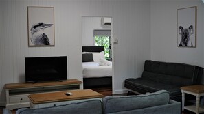 Casa família, 2 quartos | Área de estar | TV de tela plana