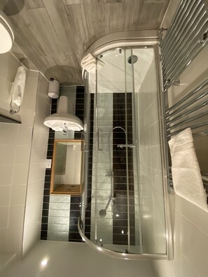 Combined shower/tub, hair dryer, towels, soap