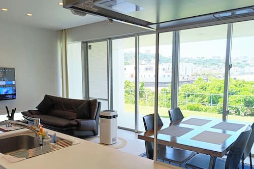 Holiday Home | Private kitchen | Full-size fridge, microwave, stovetop, electric kettle