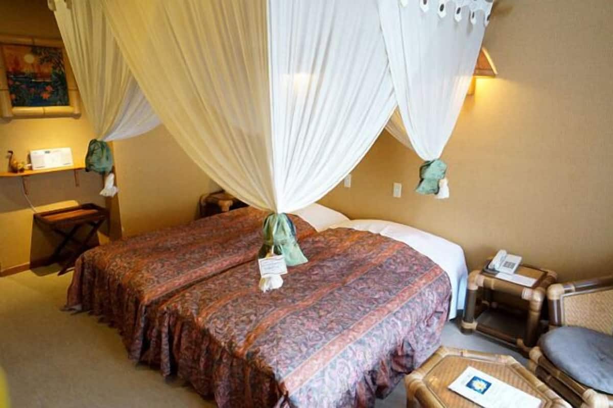 Kamar Quadruple Deluks, gedung tambahan | Meja kerja dan Wi-Fi gratis
