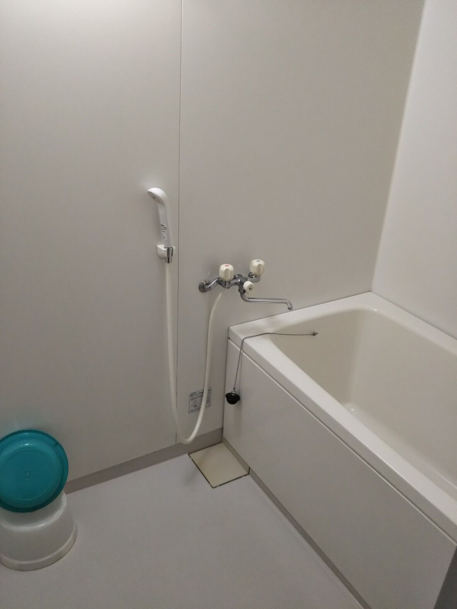 A bathroom with a bathtub, a shower, and a toilet.