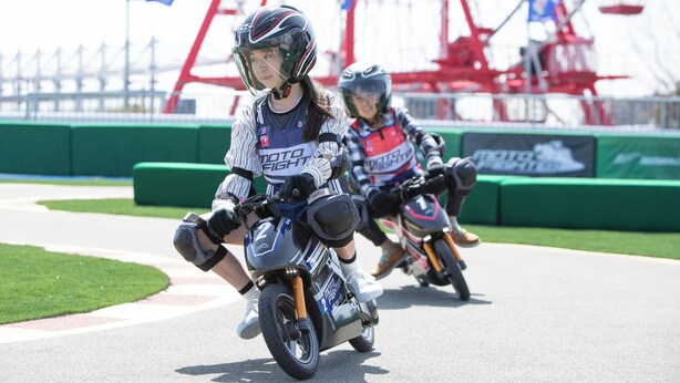 Two individuals on motorcycles on a track. - Suzuka Circuit Hotel (Suzuka)