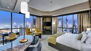 Deluxe Room (Burj Khalifa View) | In-room safe, desk, laptop workspace, blackout drapes