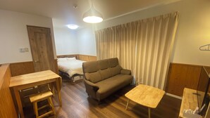Cottage | Living room | Flat-screen TV - Bise House (Motobu)
