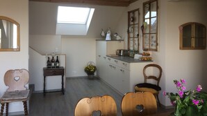 Comfort Cottage, 6 Bedrooms, Non Smoking, Terrace | Private kitchen | Coffee/tea maker, full-size fridge, oven, stovetop - Ferienhaus Friedau (Nottwil)