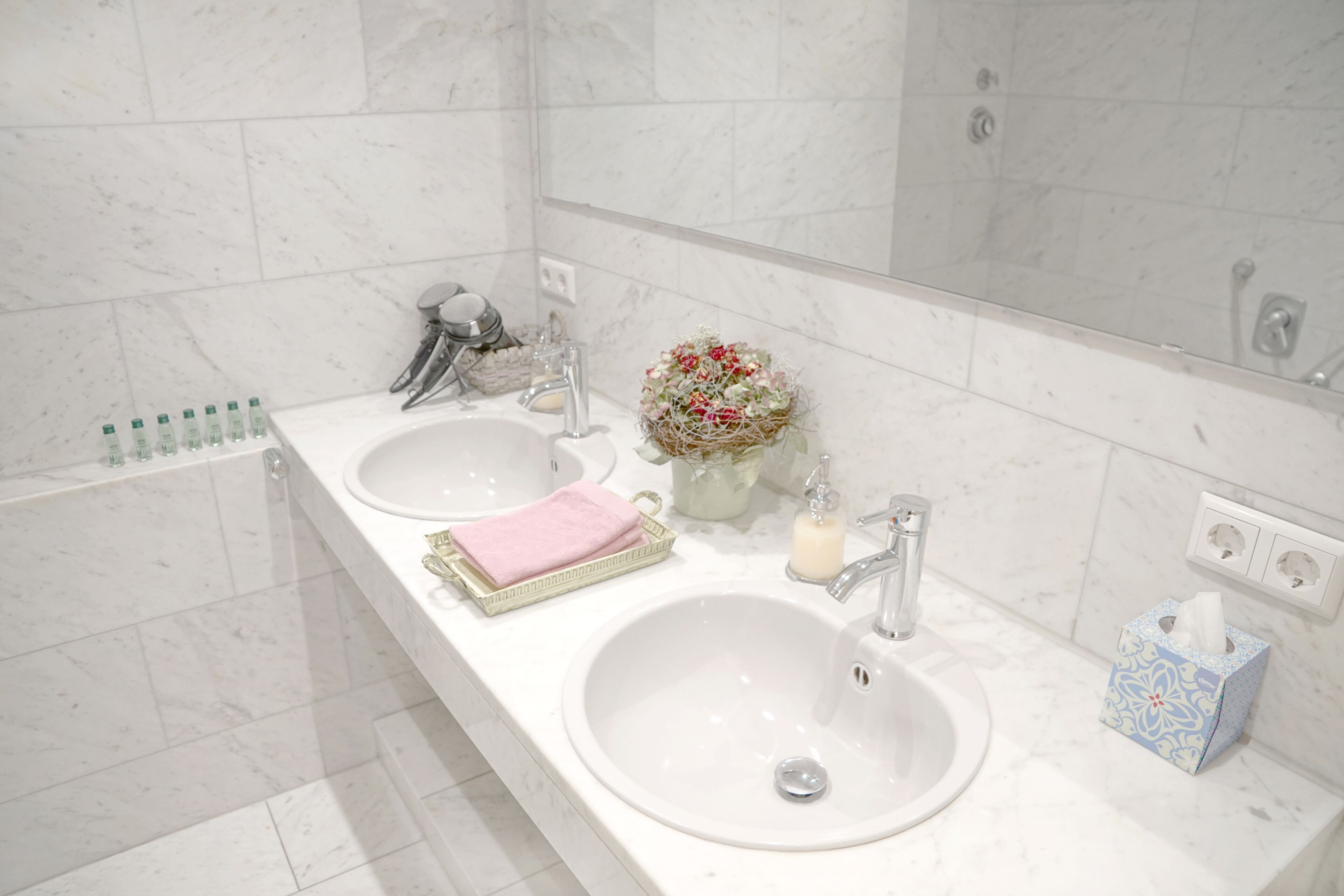 Bathtub, hair dryer, towels, soap