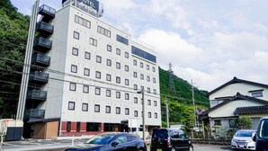 A multi-story hotel with a sign indicating it is a hotel. - Hotel Areaone Wadayama (Asago)