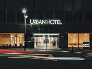 The exterior of an urban hotel with a prominent entrance and a sign that reads 'URBAN HOTEL'. - Urban Hotel (Nihommatsu)