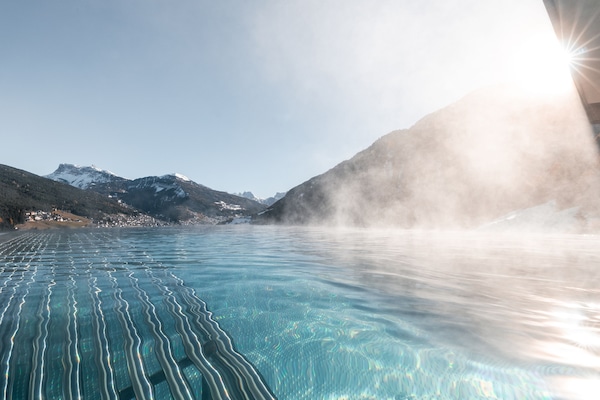 Outdoor pool, open 7:30 AM to 9:00 PM, pool loungers