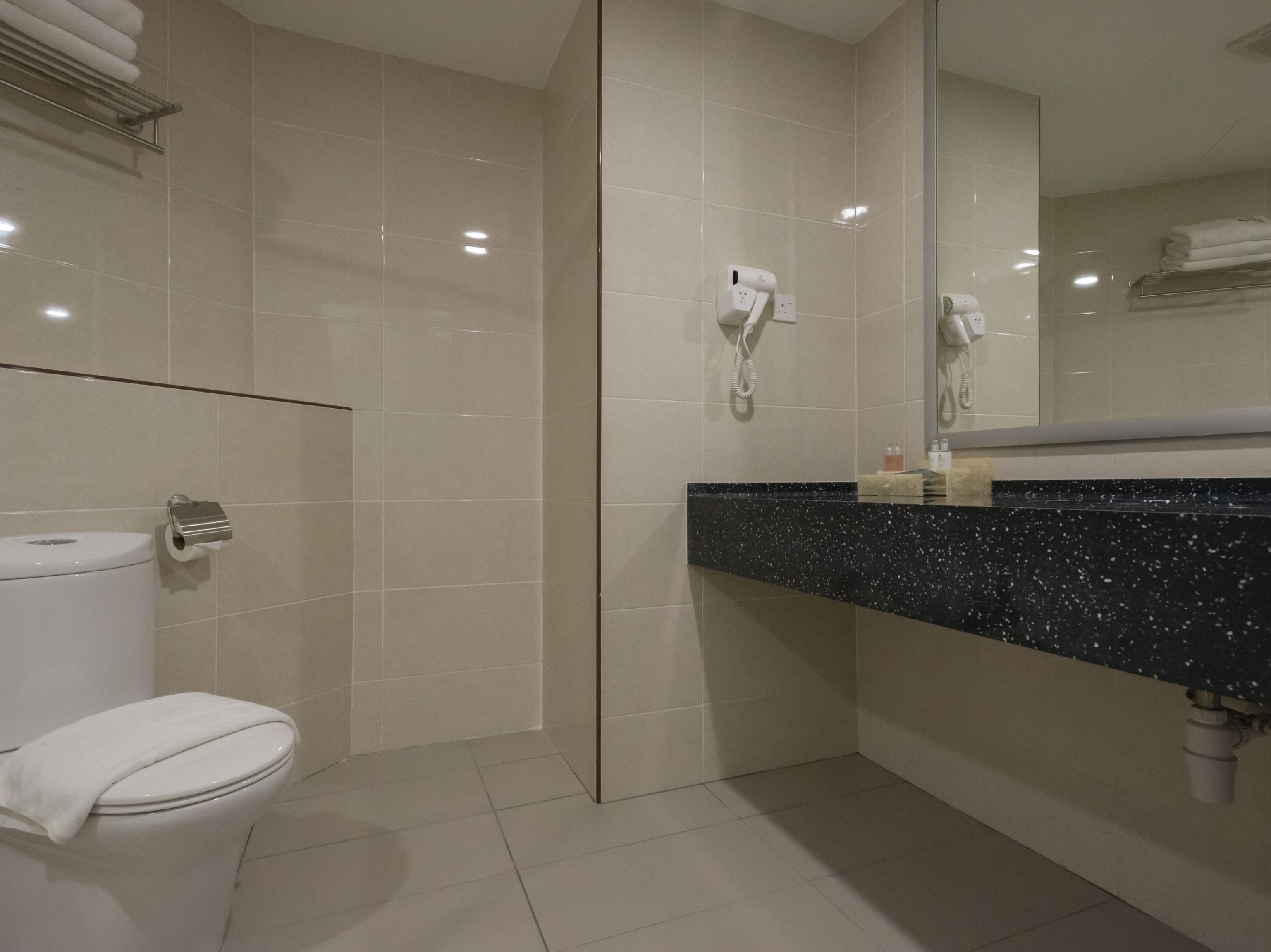executive suite | bathroom | shower, towels