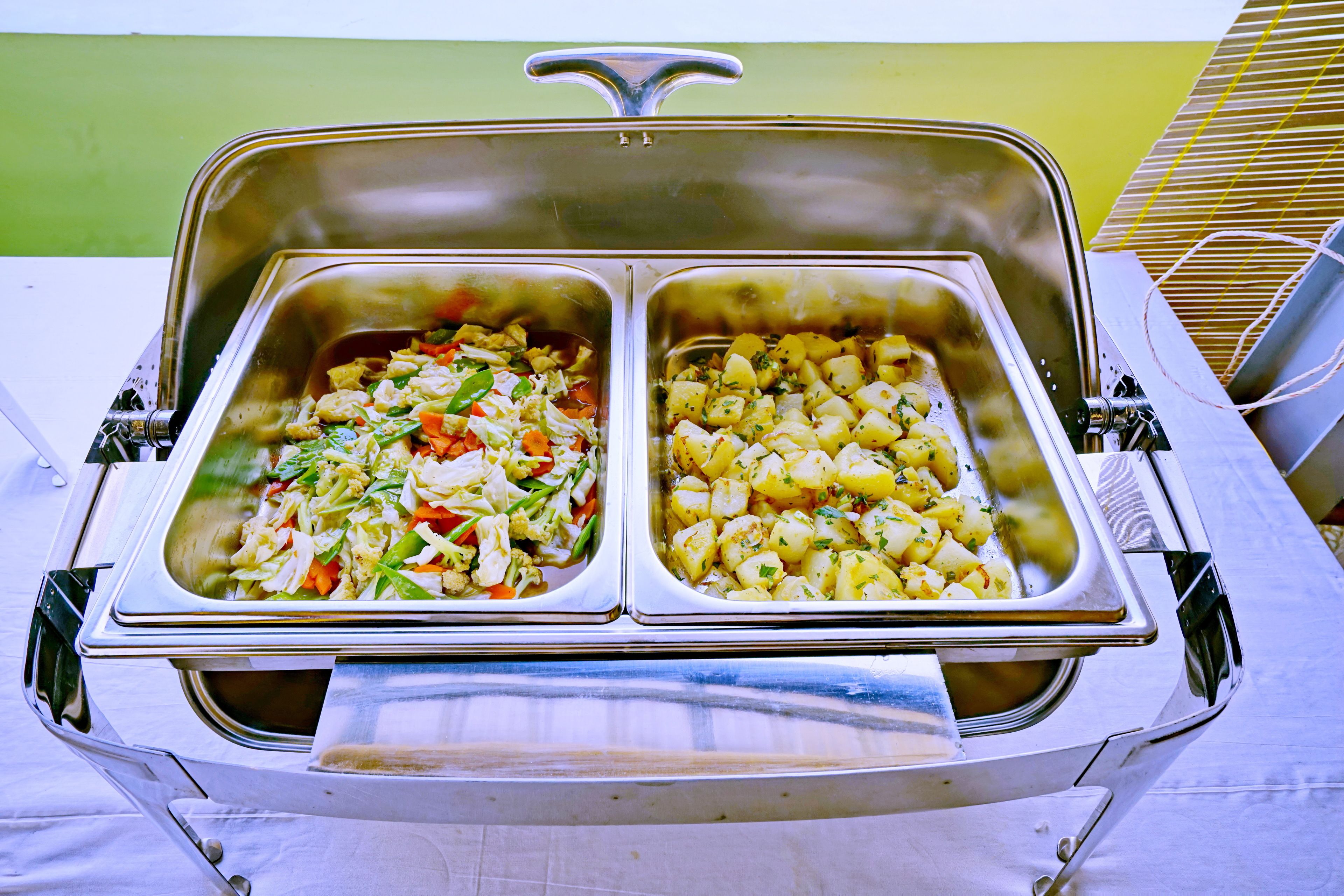 A buffet with two separate food sections.