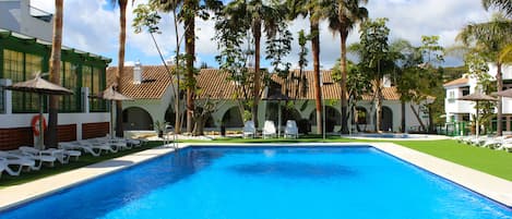 Outdoor pool, open 10:00 AM to 9:30 PM, pool umbrellas, sun loungers