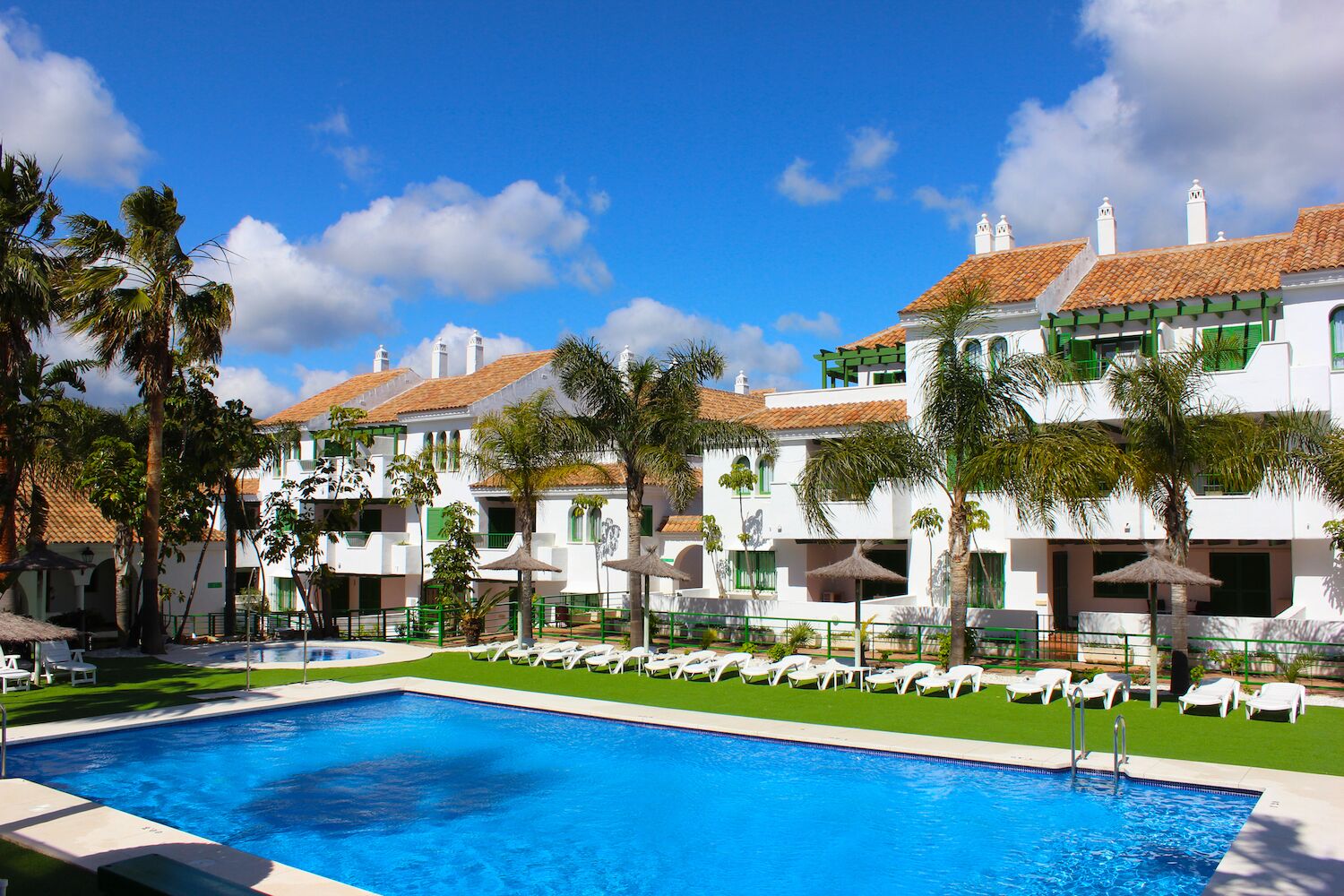 Outdoor pool, open 10:00 AM to 9:30 PM, pool umbrellas, sun loungers