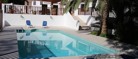 Outdoor pool, sun loungers