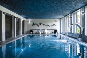 Indoor pool, seasonal outdoor pool, pool umbrellas, pool loungers