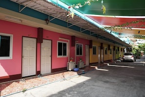 A row of colorful buildings with doors labeled A7, A8, and A9.