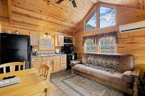 Riverfront Cabin with Deck and Fire Pit Near the Smoky Mountains!