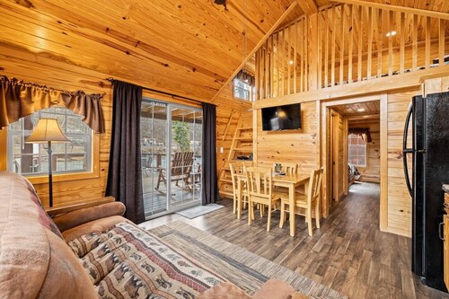 Riverfront Cabin with Deck and Fire Pit Near the Smoky Mountains!