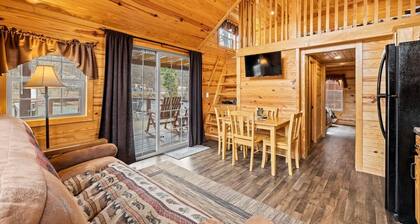 Riverfront Cabin with Deck and Fire Pit Near the Smoky Mountains!