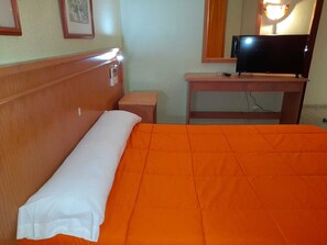 Pillow-top beds, blackout curtains, iron/ironing board, free WiFi