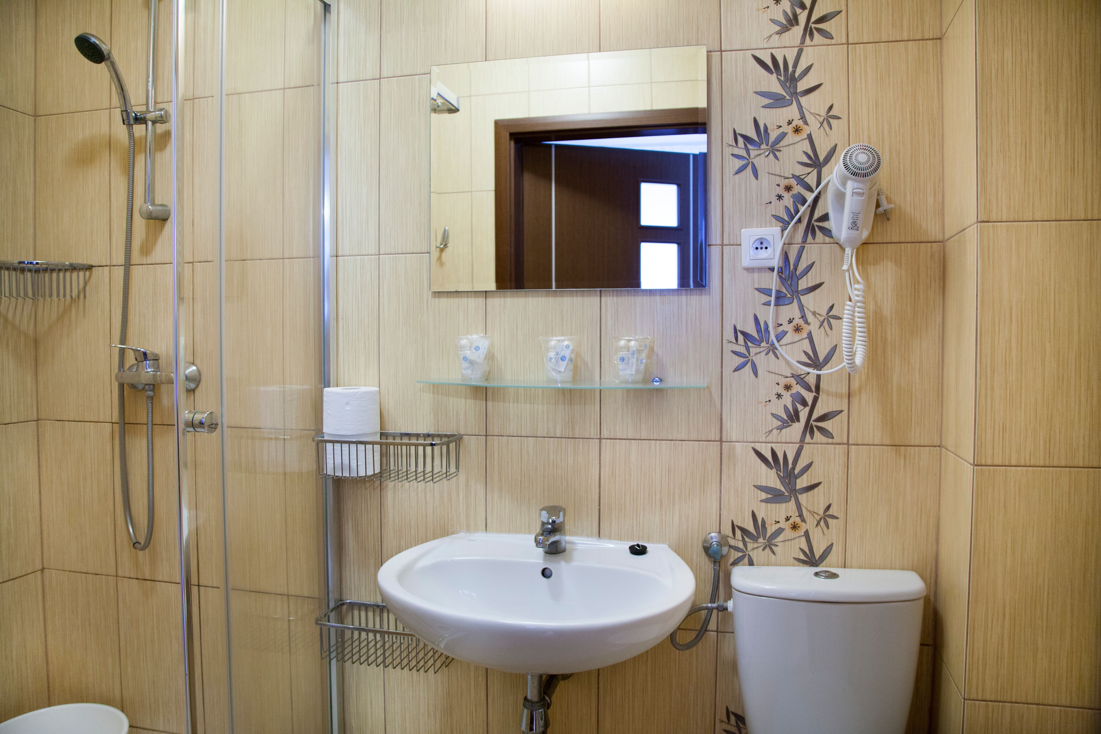 standard triple room | bathroom | shower, free toiletries, hair dryer, towels