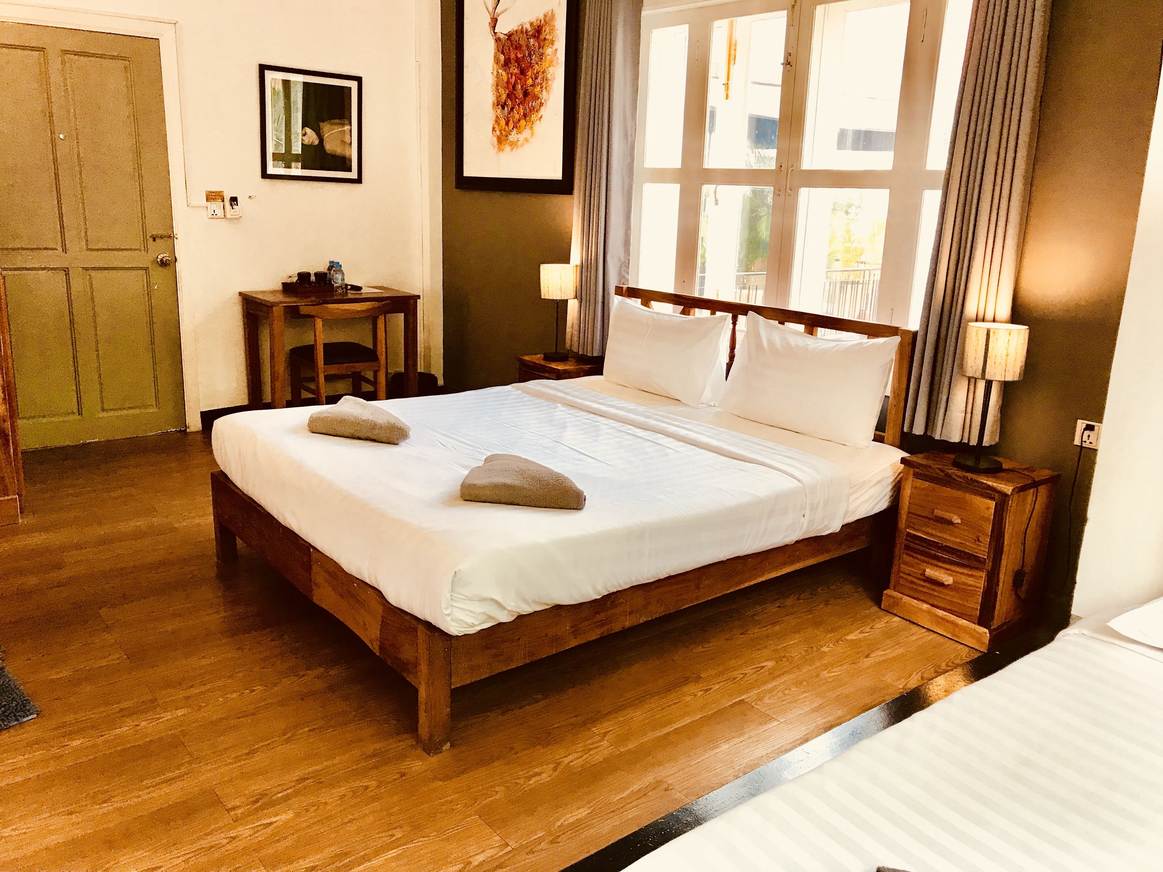 deluxe triple room | minibar, in-room safe, desk, soundproofing