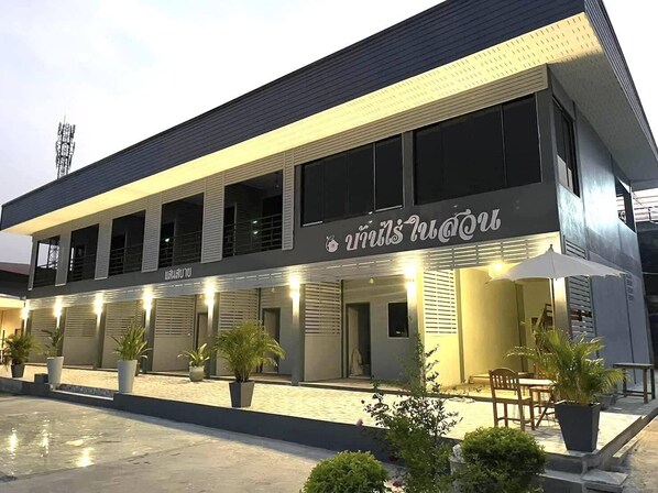 A modern building with a sign that reads "Siam House".