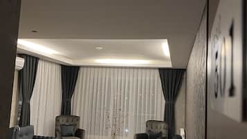 Deluxe Suite, Multiple Bedrooms, City View | 2 bedrooms, premium bedding, desk, laptop workspace