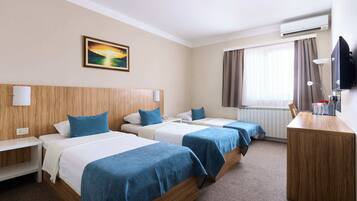 Premium bedding, memory foam beds, minibar, in-room safe