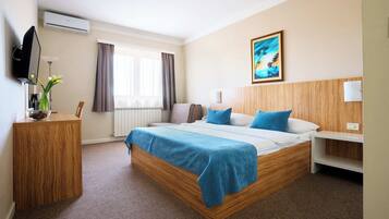 Premium bedding, memory-foam beds, minibar, in-room safe