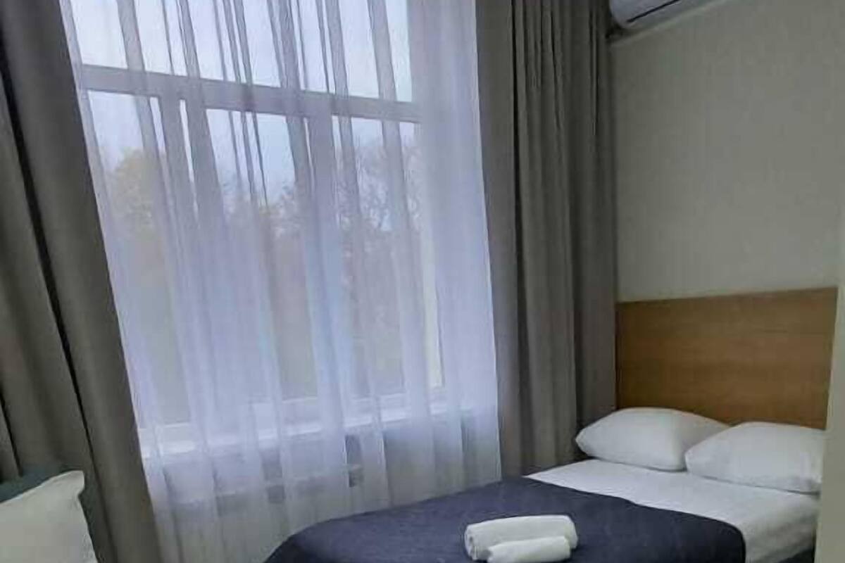 Kahden hengen economy-huone (kaksi sänkyä), 2 yhden hengen sänkyä | 1 makuuhuone, pimennysverhot, äänieristys, ilmainen Wi-Fi