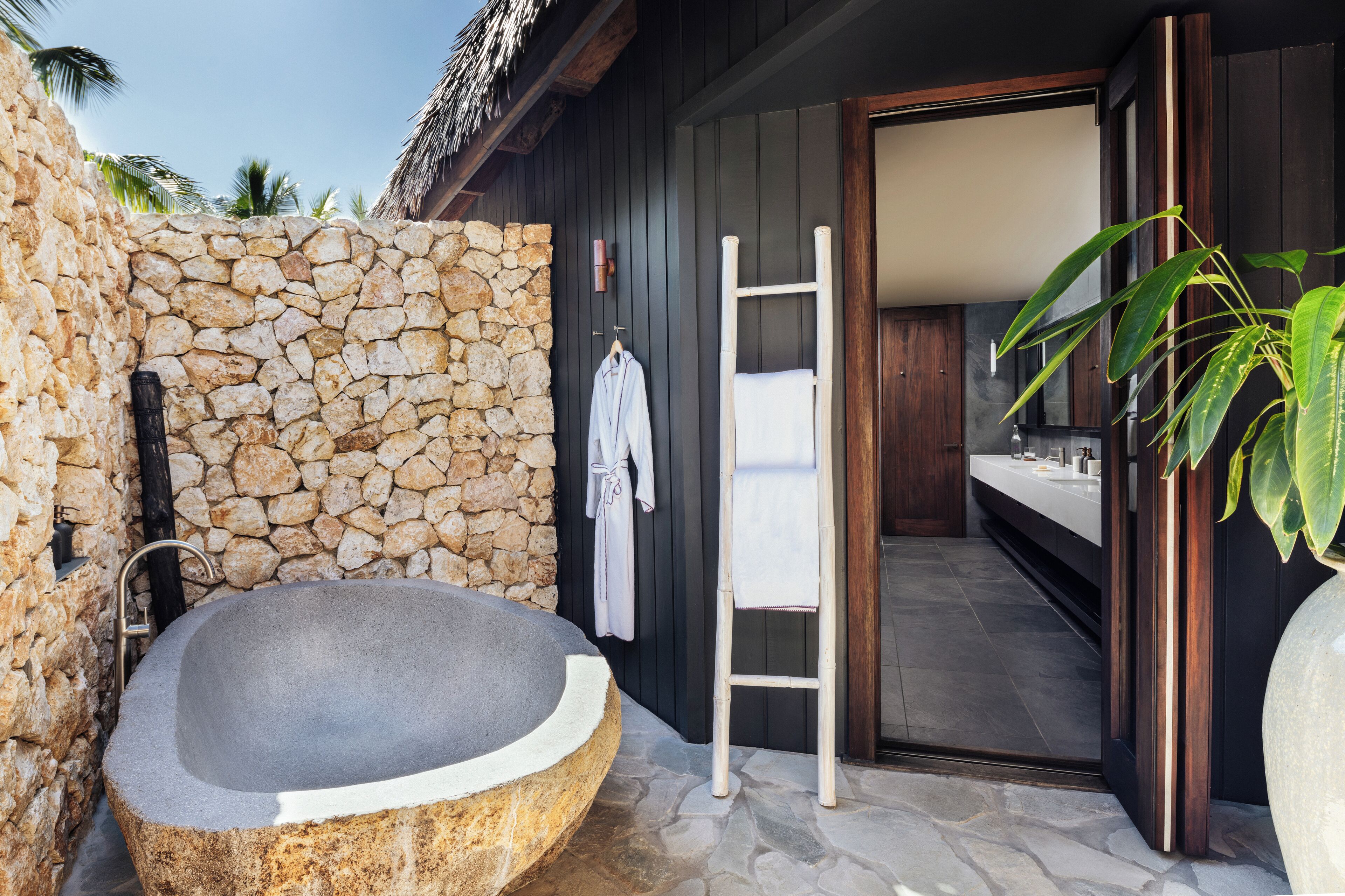 six-bedroom beachfront pool residence | bathroom | eco-friendly toiletries, hair dryer, bathrobes, slippers