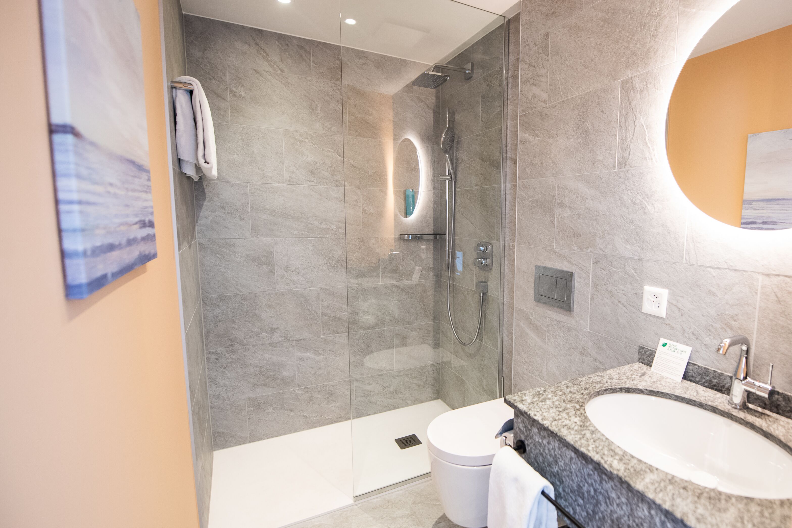 studio suite | bathroom | shower, free toiletries, hair dryer, bathrobes